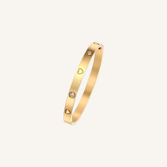 Amoura Bangle, 18K Gold Bangle, Stainless Steel Bangle, Heart Motif Bracelet, CZ Stone Bangle, Hinge Clasp Bangle, Women’s Gold Plated Jewellery, Everyday Elegant Bracelet, Black Leopard Jewellery AMOURA Bangle | AMOURA Gold Bangle | Minimalist AMOURA Jewellery | Elegant AMOURA Bracelet | Black Leopard AMOURA Bangle